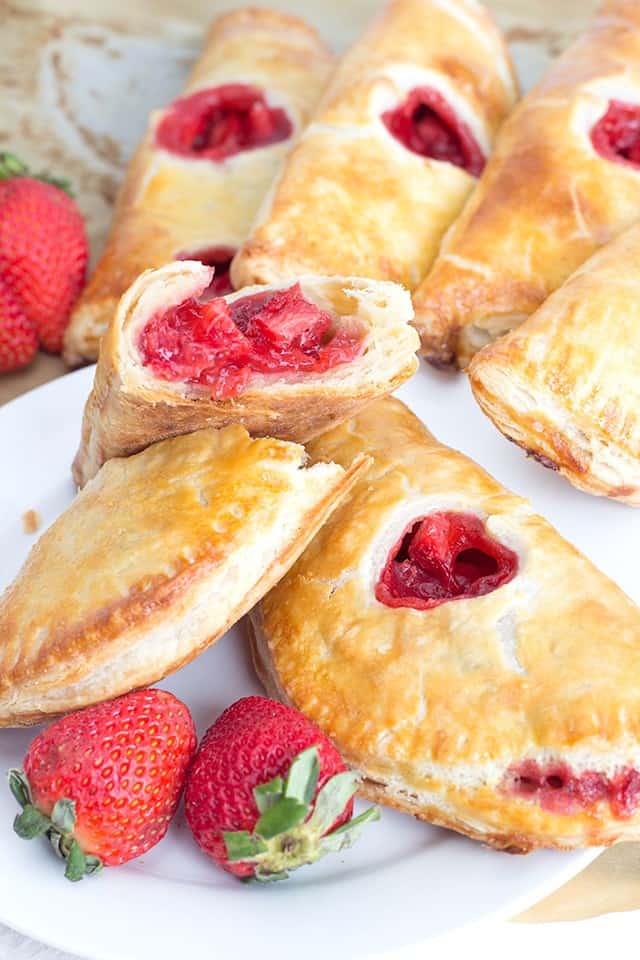 stacked strawberry hand pies showing the inside