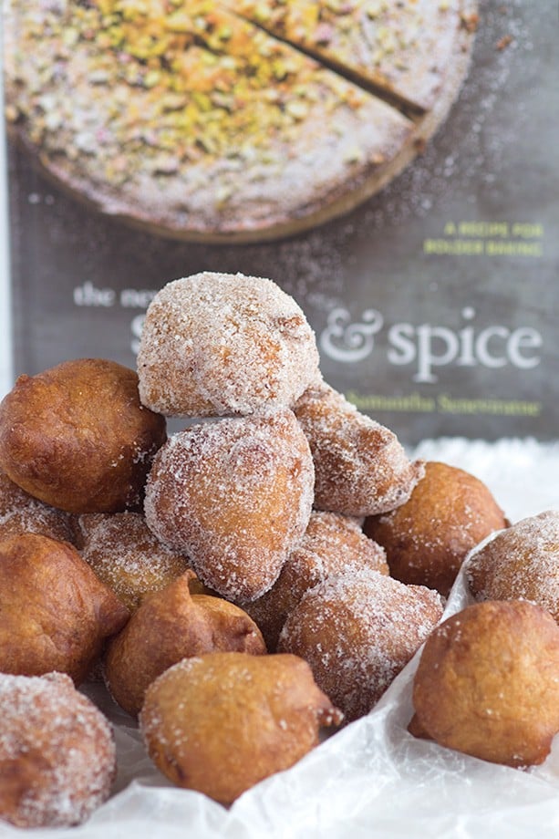 A pile of sweet banana fritters with nutmeg sugar coating