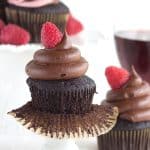 Red Wine-infused Chocolate Cupcakes with raspberries and chocolate frosting.