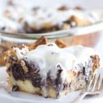 A slice of Cookies and Cream Bread Pudding on a plate with a fork.