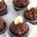 Chocolate banana cupcakes with frosting.