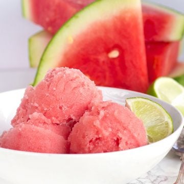 Watermelon sorbet with lime garnish.