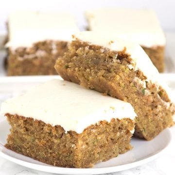 Peanut Butter Zucchini Squares - moist peanut butter squares full of shredded zucchini and carrots and topped with a cream cheese frosting.