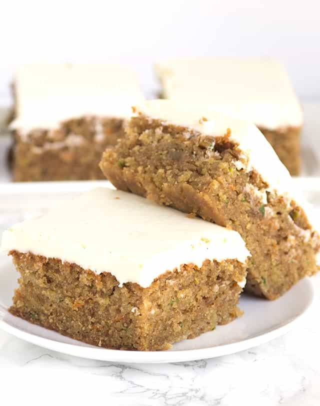 Peanut Butter Zucchini Squares - moist peanut butter squares full of shredded zucchini and carrots and topped with a cream cheese frosting.