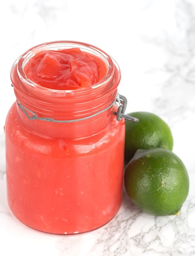 Rasberry Lime Curd - the perfect filling for meringues, cakes, or out of the jar. It's tangy and sweet!