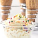 Delicious ice cream cones topped with cake batter frosting.