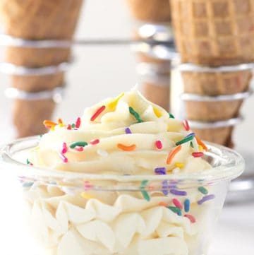 Delicious ice cream cones topped with cake batter frosting.