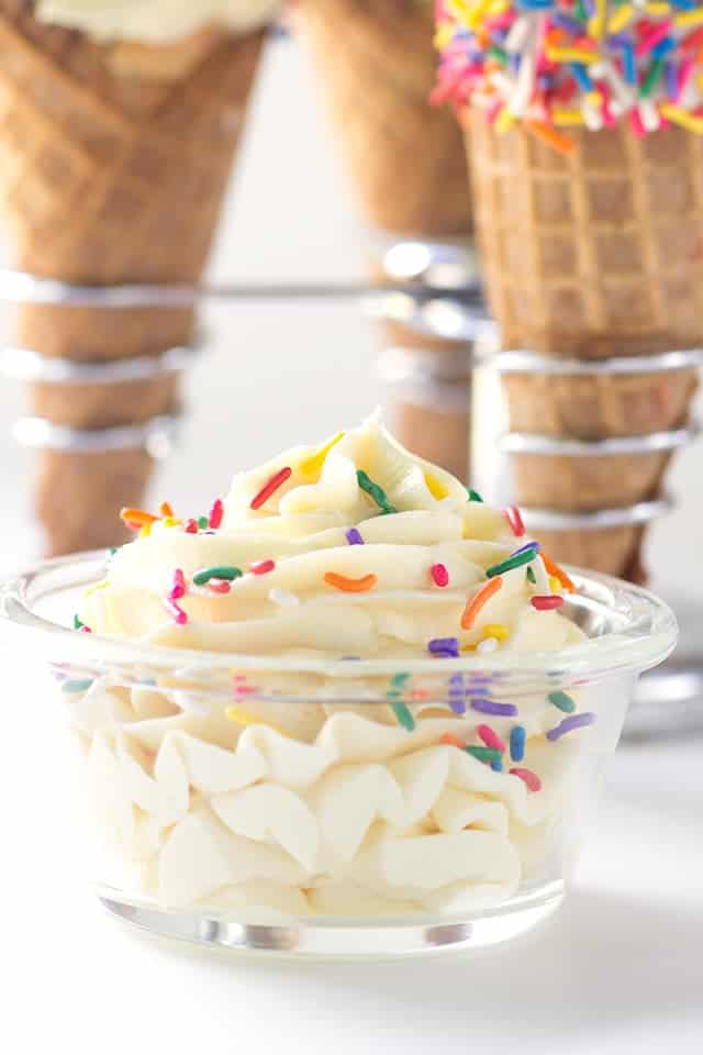 Delicious ice cream cones topped with cake batter frosting.