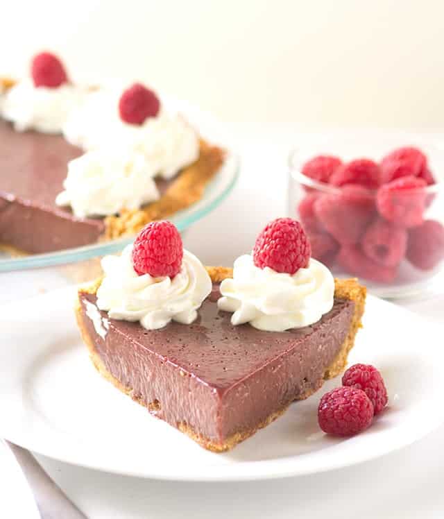 Chocolate Raspberry Pie - This is key lime pies friend, chocolate raspberry pie. The pie is loaded with fresh raspberry puree and chocolate flavored sweetened condensed milk.