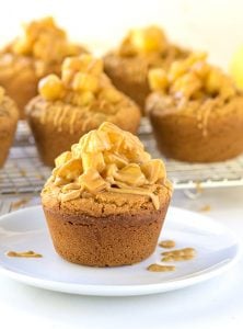 Apple Pie Peanut Butter Cookie Cups - peanut butter cookies baked inside cupcake tins and then stuffed with apple pie filling!