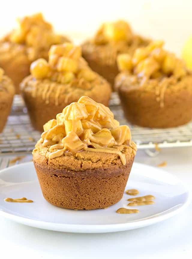 Apple Pie Peanut Butter Cookie Cups - peanut butter cookies baked inside cupcake tins and then stuffed with apple pie filling!