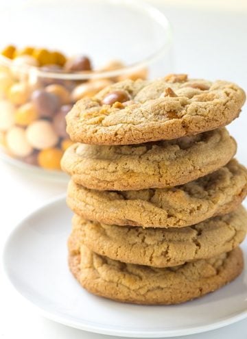 stack of chewy butterscotch cookies on a white plate