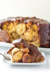 Crock Pot Monkey Bread - Want to get more use out of that crock pot? I have the perfect monkey bread to throw in it. My favorite part is the caramel top that coats the monkey bread!