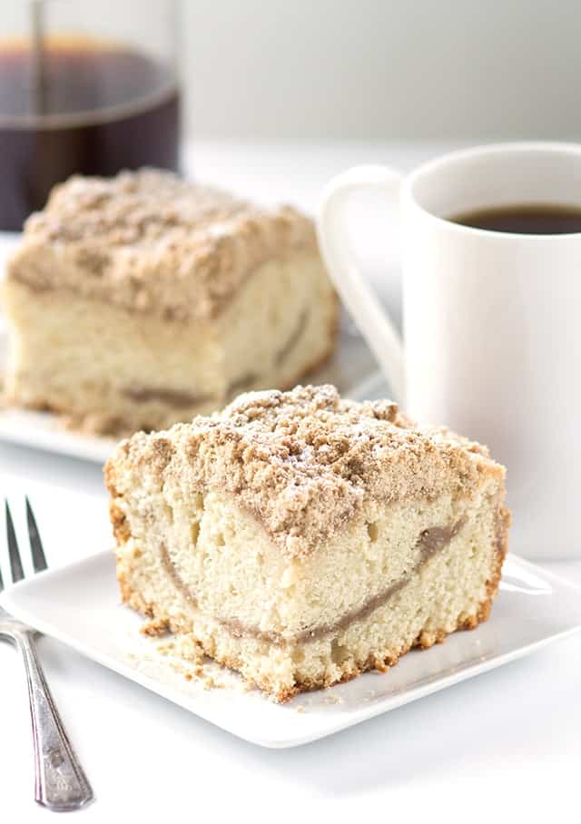 Old Fashioned Coffee Cake - Thick coffee cake with a layer of streusel inside the cake and on top of the cake. It also have a nice addition of strong coffee in the recipe for the coffee lovers! So get your morning coffee ready and have a slice of this coffee cake.