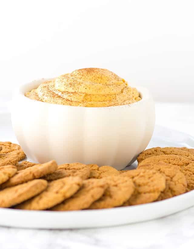 Pumpkin Pie Dip - fluffy dip loaded with pumpkin, spice, and everything nice. It tastes like a mouth full of pumpkin pie and goes perfectly with gingersnaps or graham crackers.