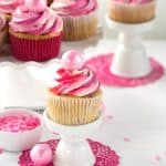 Strawberry Cupcakes - Vanilla cupcakes with finely diced strawberries mixed into the batter. The cupcakes are topped with pinks in honor of breast cancer awareness!