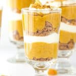 Keywords Used: Spiced Pumpkin Parfaits

Modified Description: Whipped cream and nuts top a trio of Spiced Pumpkin Parfaits in glasses.