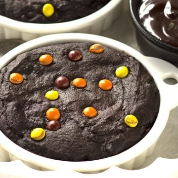 A plate of chocolate brownies with chocolate chips, perfect for two.