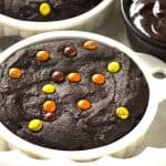Chocolate Cookies For Two - rich chocolate cookies with a chocolate candy bar center and topped with some peanut butter filled candies. The perfect dessert for two!