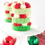 Christmas Tree Cake - Fun and festive green ombre cakes with red and white frosting piped in pretty shells.