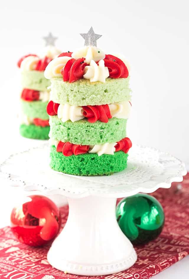 Christmas Tree Cake - Fun and festive green ombre cakes with red and white frosting piped in pretty shells.