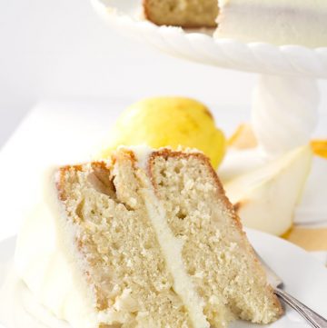 Ginger Pear Cake - dense cake filled with chunks of pear, topped with ginger simple syrup and slathered with ginger frosting.