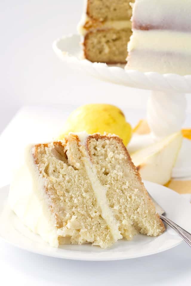 Ginger Pear Cake - dense cake filled with chunks of pear, topped with ginger simple syrup and slathered with ginger frosting.
