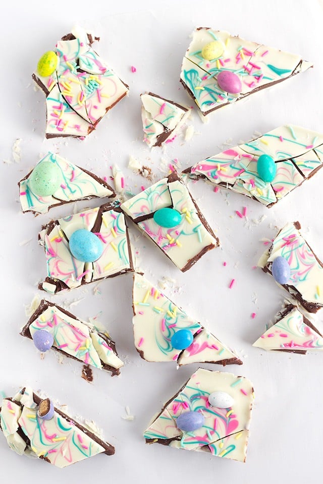 Easter Truffle Bark - milk chocolate ganache sandwiched between white chocolate and topped with delicious Easter candies and festive sprinkles.