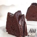 slice of homemade chocolate whiskey cake with whiskey-infused chocolate frosting