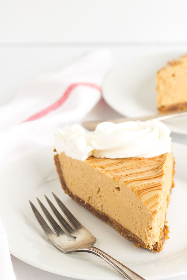 Cookie Butter Pie -a speculoos cookie crust with a creamy cookie butter cheesecake mousse filling. Drizzle with a little additional cookie butter and pipe some whipped cream swirls to finish the pie. 