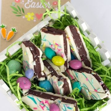 Easter Truffle Bark - milk chocolate ganache sandwiched between white chocolate and topped with delicious Easter candies and festive sprinkles.