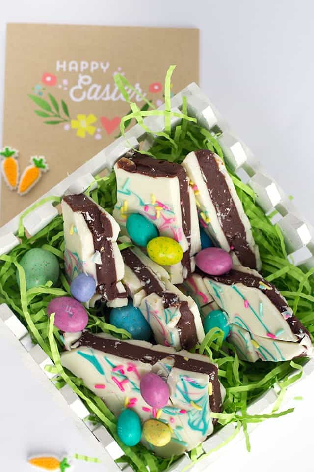 Easter Truffle Bark - milk chocolate ganache sandwiched between white chocolate and topped with delicious Easter candies and festive sprinkles.
