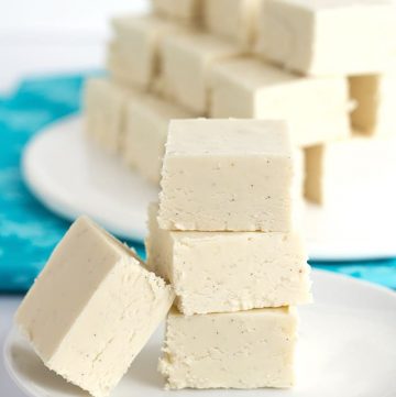 This vanilla fudge recipe is smooth and creamy. It's packed full of specks of vanilla bean too! It's so simple to make and finishes with marshmallow creme aka fluff!