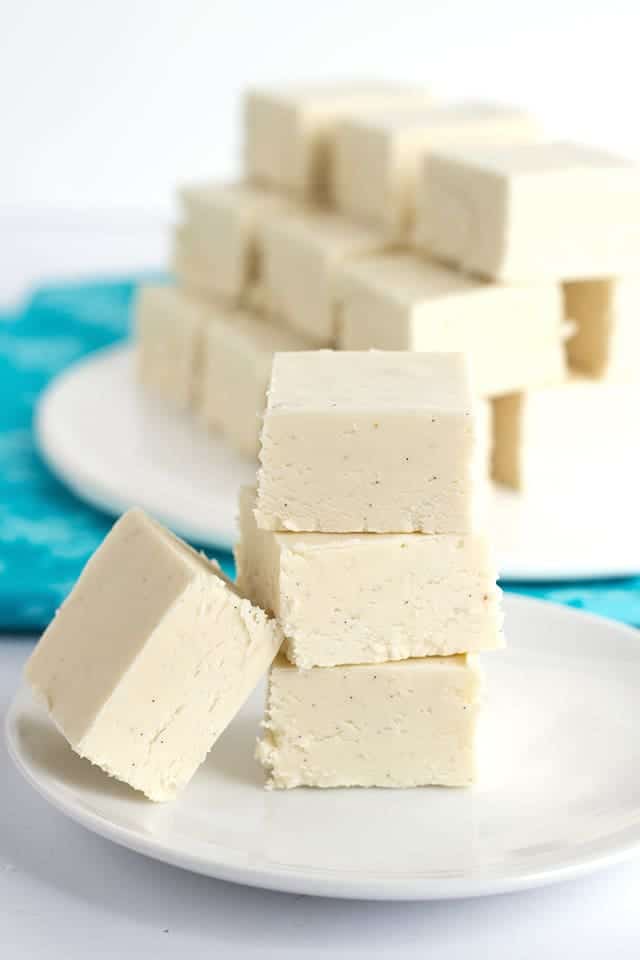 This vanilla fudge recipe is smooth and creamy. It's packed full of specks of vanilla bean too! It's so simple to make and finishes with marshmallow creme aka fluff!