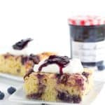 Bacon Blueberry Baked Pancakes - Need to feed a crowd or maybe just want to make a big brunch?This baked pancake done in a casserole dish is the way to go. It's packed with candied bacon, blueberry preserves, and brie cheese. Top with whipped cream and some more preserves and eat up!