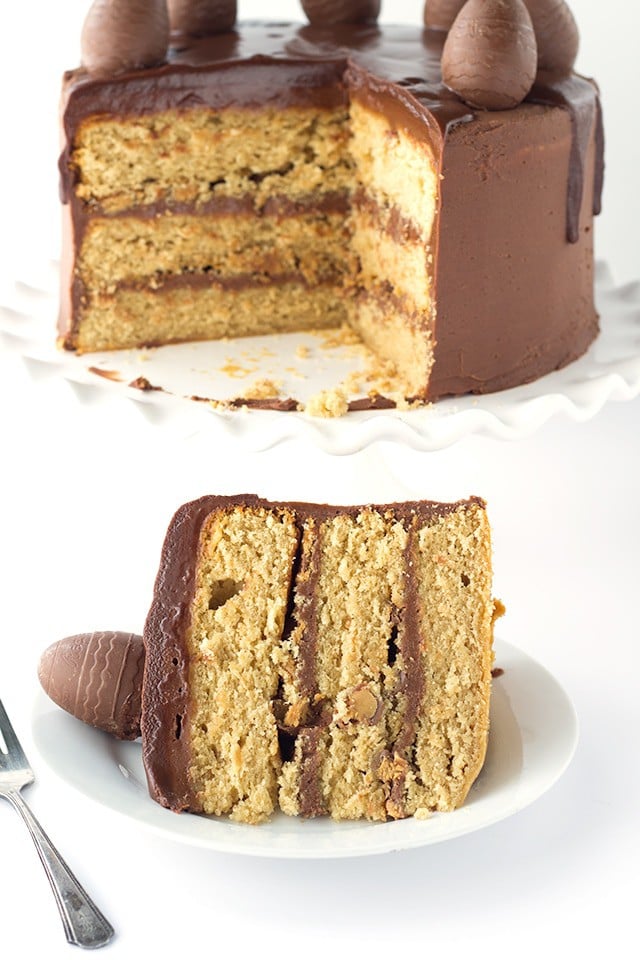 Peanut Butter Cake with Chocolate Frosting - peanut butter cake filled with chocolate frosting and chopped peanut butter cups. Top this cake with a chocolate peanut butter ganache and cute peanut butter filled chocolate eggs for EASTER! 