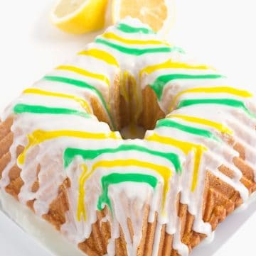 Tangy Lemon Lime Cake with Lemon Lime Glaze - It's a dense made from scratch pound cake with a box of lemon pudding and lime juice added in. The vibrant green and yellow stripes pop every bit as much as the flavor!