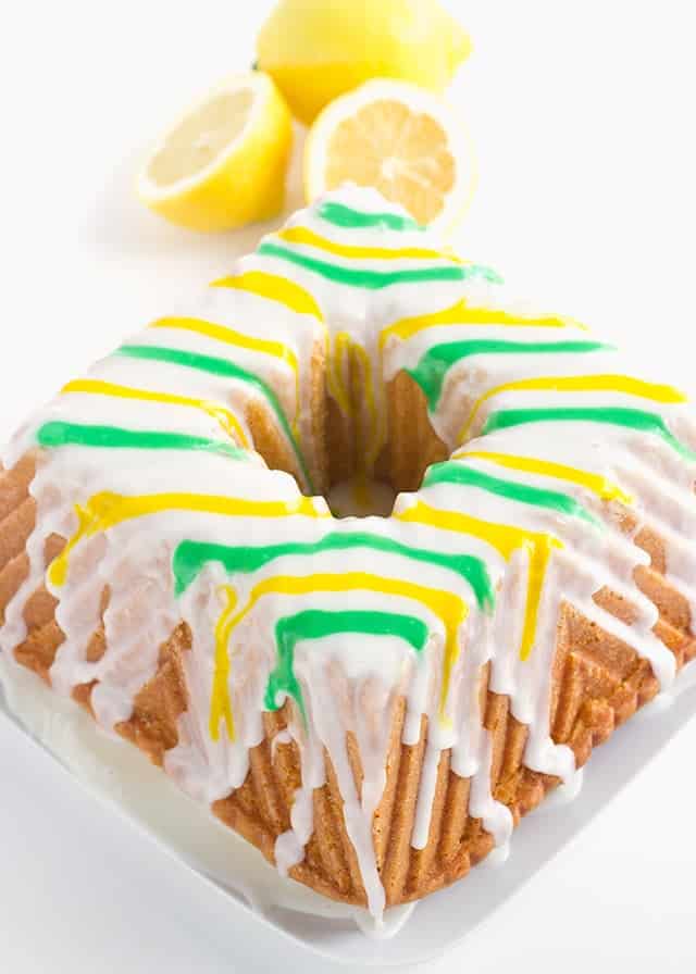 Tangy Lemon Lime Cake with Lemon Lime Glaze - It's a dense made from scratch pound cake with a box of lemon pudding and lime juice added in. The vibrant green and yellow stripes pop every bit as much as the flavor!