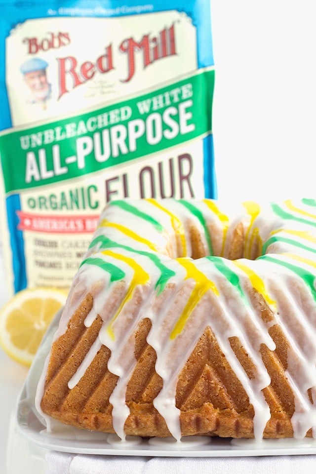 Tangy Lemon Lime Cake with Lemon Lime Glaze - It's a dense made from scratch pound cake with a box of lemon pudding and lime juice added in. The vibrant green and yellow stripes pop every bit as much as the flavor!