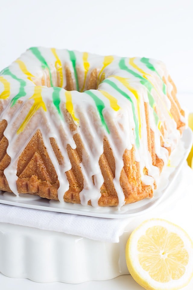 Tangy Lemon Lime Cake with Lemon Lime Glaze - It's a dense made from scratch pound cake with a box of lemon pudding and lime juice added in. The vibrant green and yellow stripes pop every bit as much as the flavor!
