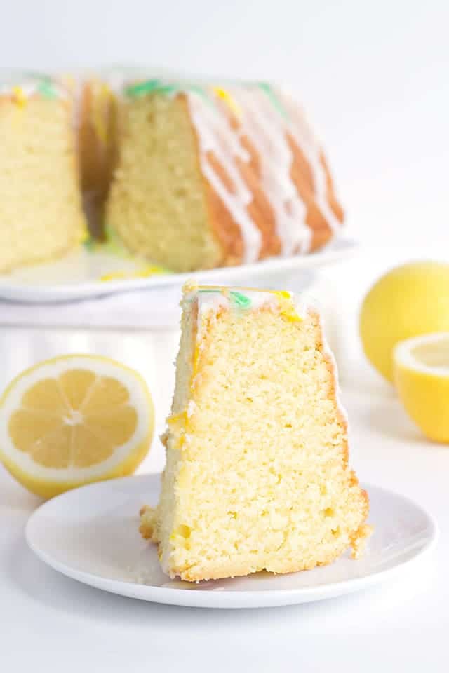 Tangy Lemon Lime Cake with Lemon Lime Glaze - It's a dense made from scratch pound cake with a box of lemon pudding and lime juice added in. The vibrant green and yellow stripes pop every bit as much as the flavor!