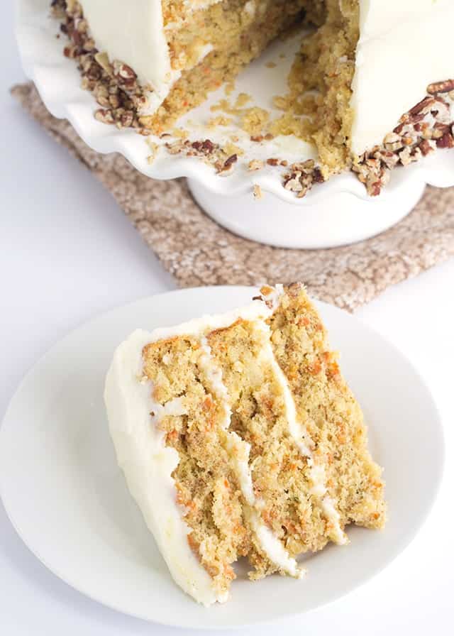 overhead image of a slice of Carrot Cake with Pineapple topped with Pineapple Juice infused Cream Cheese Frosting