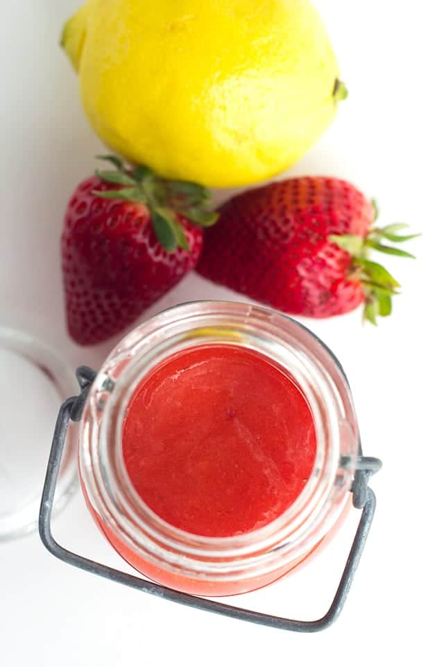 Strawberry Lemon Curd - fresh pureed strawberries and lemon juice make the perfect filling. It's sweet and is a delicious spring flavor to put in your cookies, cakes, and cupcakes!