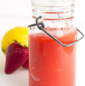 Strawberry Lemon Curd - fresh pureed strawberries and lemon juice make the perfect filling. It's sweet and is a delicious spring flavor to put in your cookies, cakes, and cupcakes!