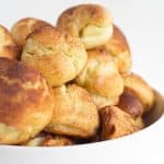 Churro Cream Puffs - easy cream puffs topped with cinnamon and sugar and filled with a cinnamon whipped cream.