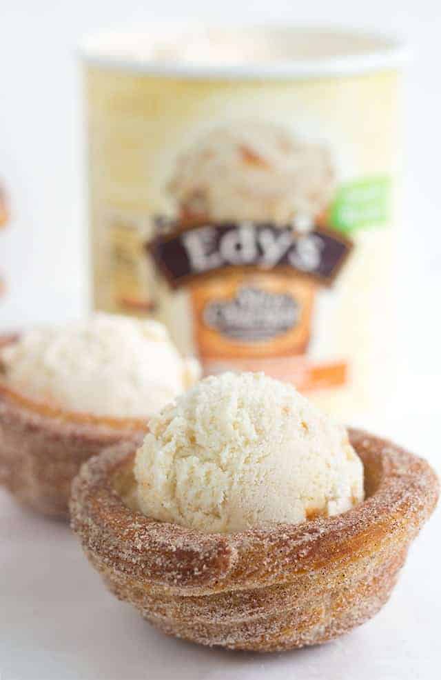 Churro Ice Cream Cups that are easy to make and fun to eat! They're piped on cupcake tins for the perfect serving size and baked, not fried, so they're a little better for you. They're perfect for summer parties and everyone eats their cup so no dirty dishes. 