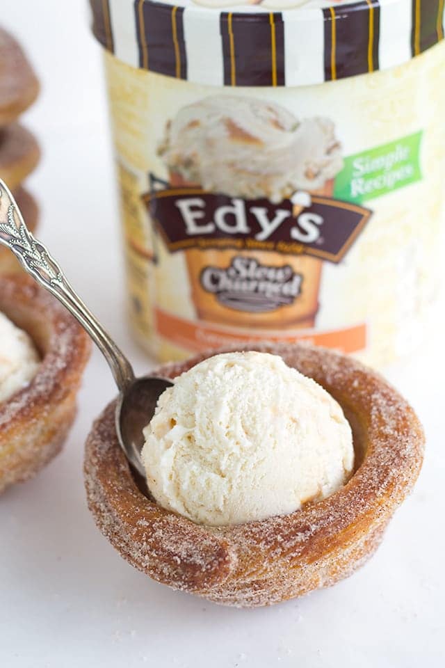 Churro Ice Cream Cups that are easy to make and fun to eat! They're piped on cupcake tins for the perfect serving size and baked, not fried, so they're a little better for you. They're perfect for summer parties and everyone eats their cup so no dirty dishes. Churro Ice Cream Cups that are easy to make and fun to eat! They're piped on cupcake tins for the perfect serving size and baked, not fried, so they're a little better for you. They're perfect for summer parties and everyone eats their cup so no dirty dishes.