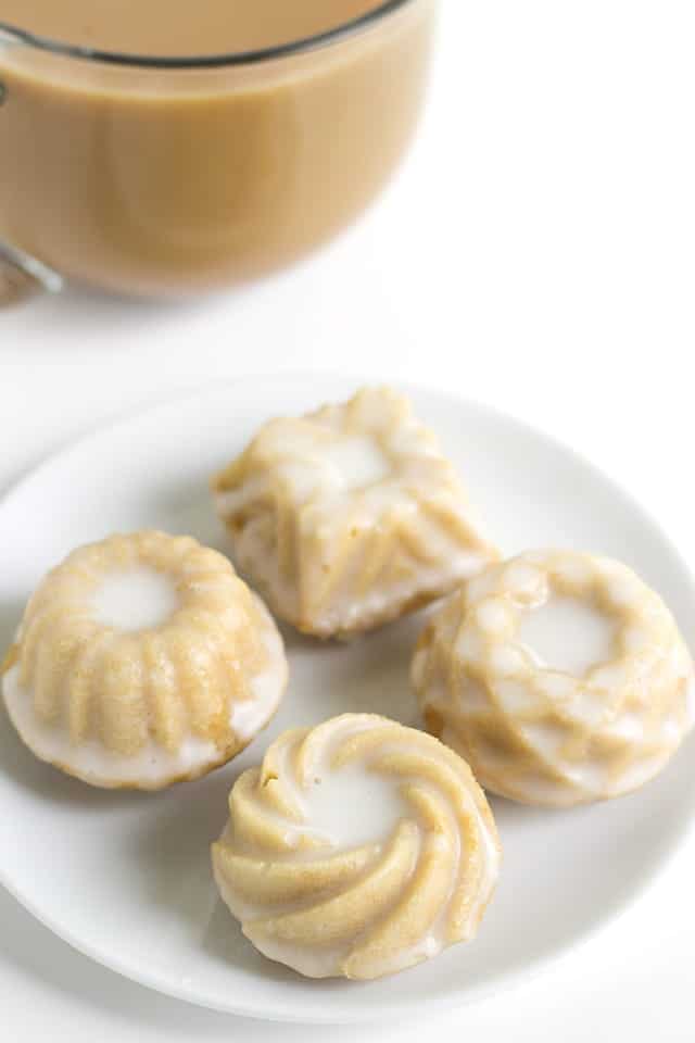 Mini Coffee and Cream Cakes - Moist little coffee flavored cakes with a vanilla butter glaze poured over top.