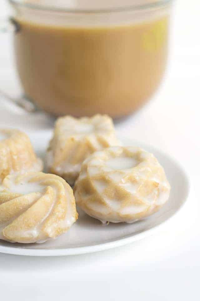 Mini Coffee and Cream Cakes - Moist little coffee flavored cakes with a vanilla butter glaze poured over top.