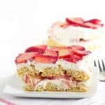 Strawberry Tiramisu - the perfect summer dessert. It's layered with strawberries, soaked in orange juice and limoncello for some bright, fun flavors.